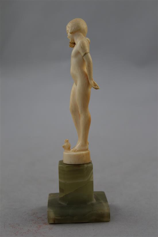 Attributed to Ferdinand Preiss, An Art Deco carved ivory figure of a young girl, 6in.